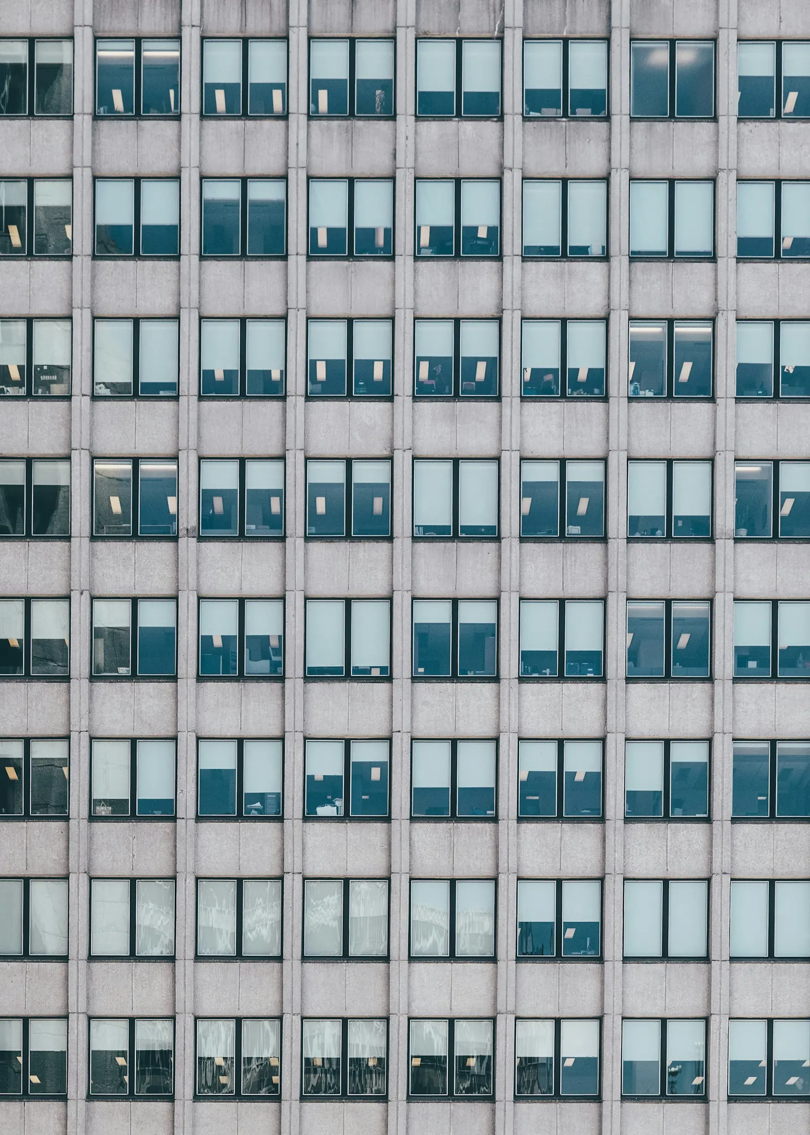 A building facade with rows of identical windows